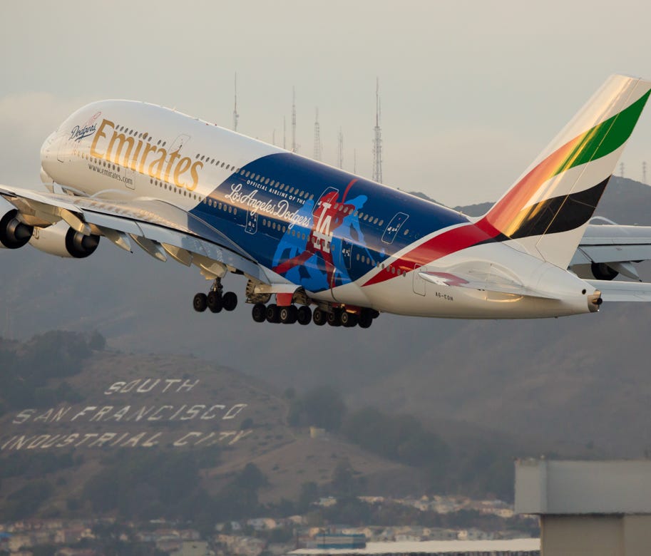 An Emirates Airbus A380 painted in a Los Angeles Dodgers livery departs for Dubai from San Francisco International Airport on Oct. 23, 2016.