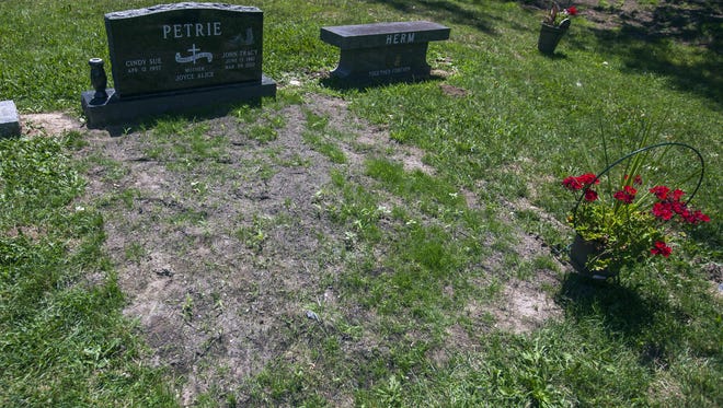 Joyce Petrie's son's grave at St. Andrew  Cemetery in Saginaw Township.