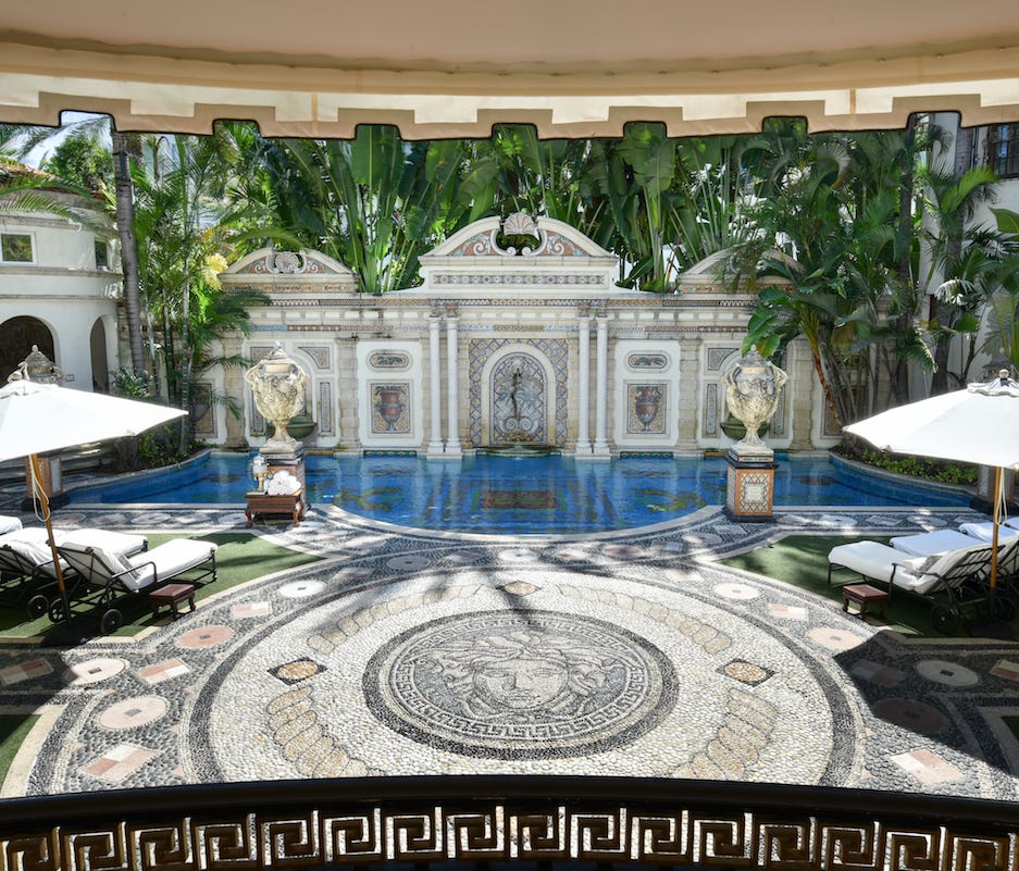 The 54-foor long pool at the former Versace mansion is lined with more than a million mosaic tiles, many of them 24-karat gold, in what is known as the Mosaic Garden.