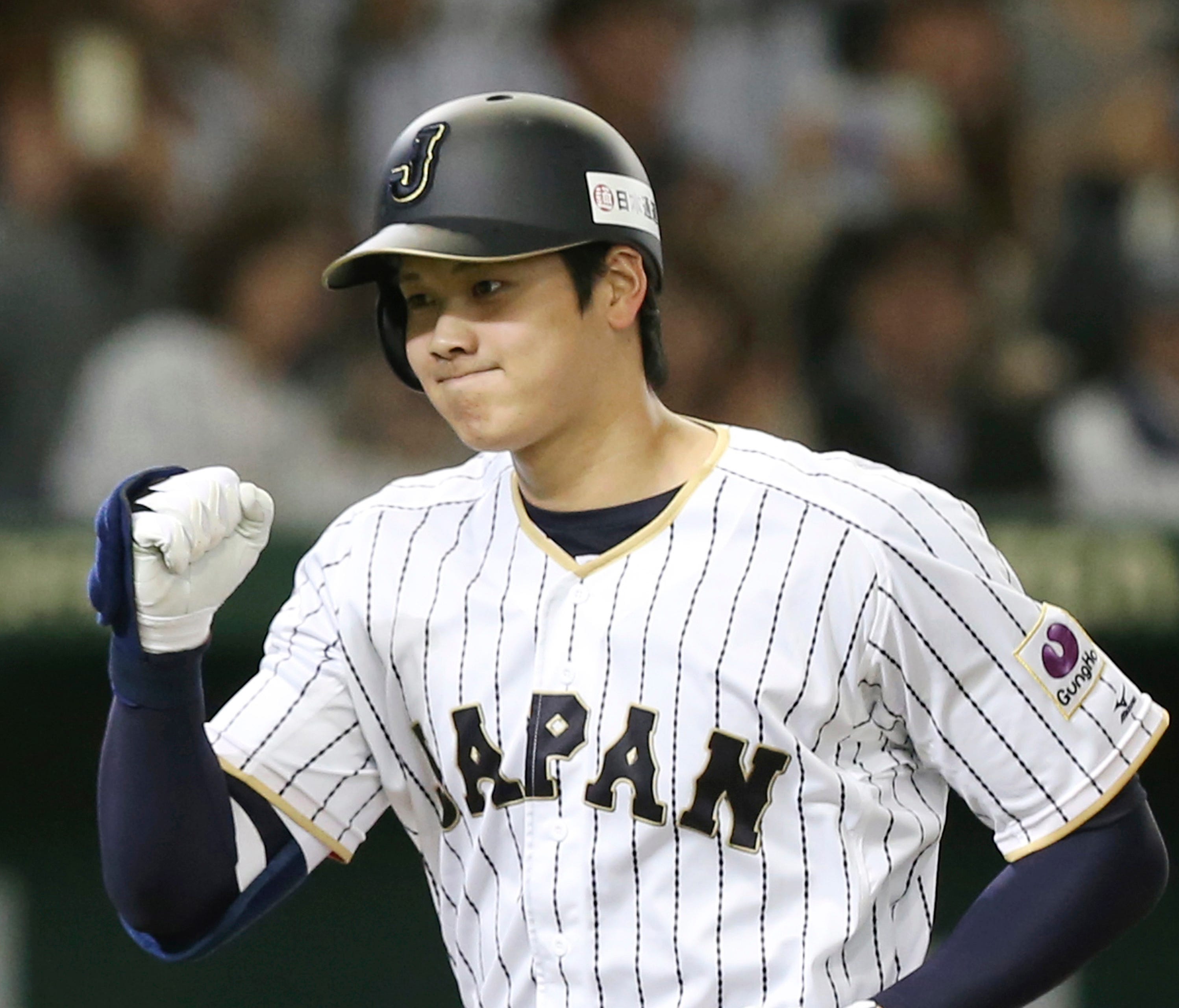 Shohei Ohtani would be limited to a minor league contract with a signing bonus under MLB's new collective bargaining agreement.