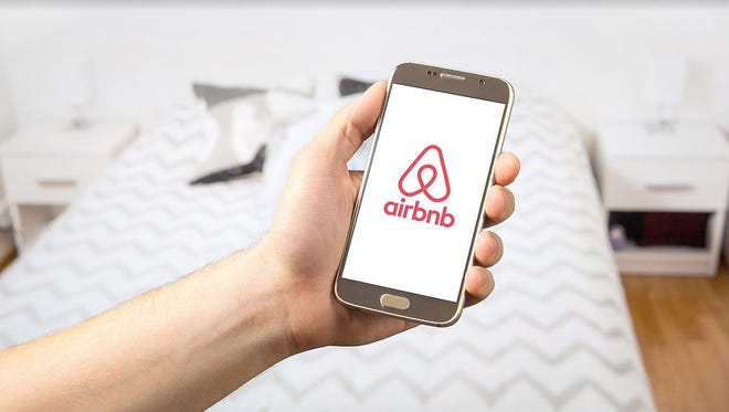 Airbnb shown on a mobile phone.