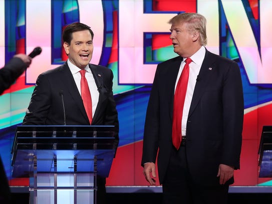 Then-GOP presidential candidates Marco Rubio and Donald