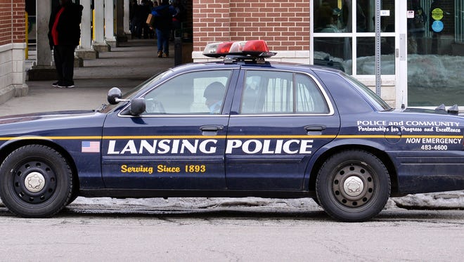 A Lansing Police car parked at the side entrance of the Lenawee Street CATA station. Greg DeRuiter/LSJ