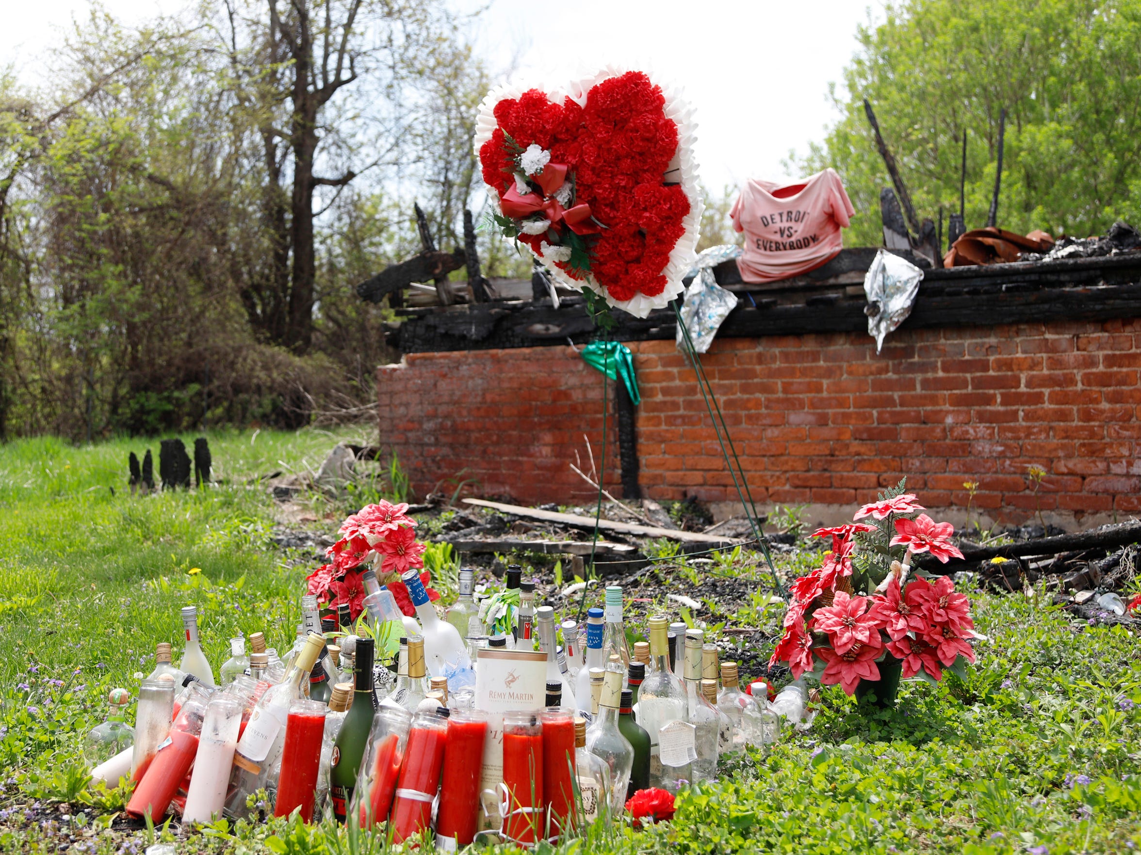 A shrine outside of 5797 Garland Street, where Jevonta Malone, 26, was shot and killed in July 2016. (Photo taken May 9, 2018)