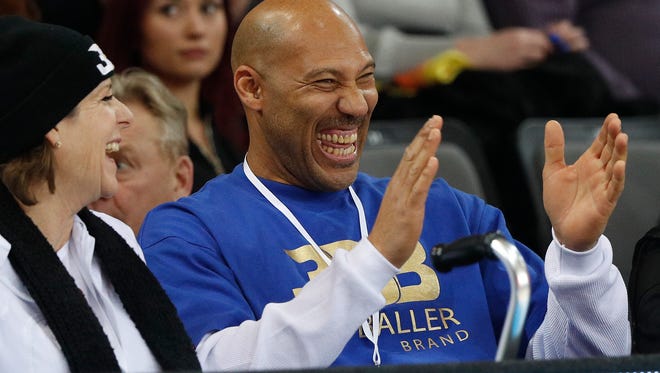 LaVar Ball watches his sons during the Big Baller Brand Challenge friendly tournament match between BC Prienu Vytautas and BC Zalgiris-2 at the BC Prienai-Birstonas Vytautas arena, in Prienai, Lithuania, Tuesday, Jan. 9, 2018. LiAngelo Ball and LaMelo Ball, sons of former basketball player LaVar Ball, have signed a one-year contract and play their first match for Lithuanian professional basketball club Prienu Vytautas. (AP Photo/Liusjenas Kulbis)