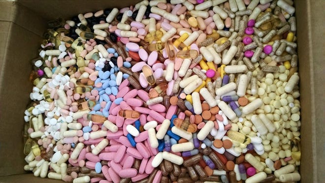 CONTRIBUTED PHOTOS A box full of unwanted or expired pills collected during an event to help consumers safely dispose of old drugs.