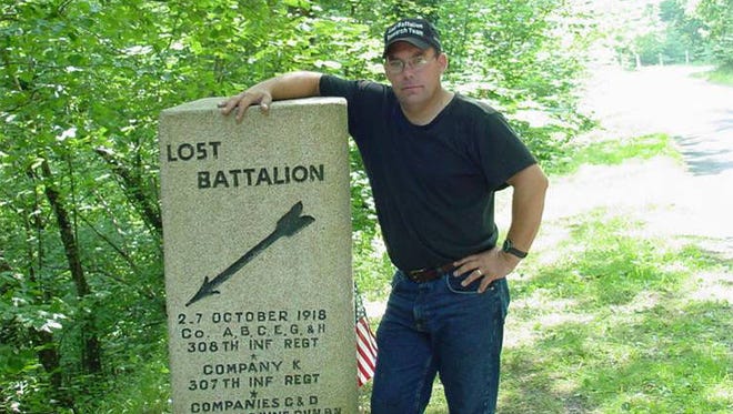 Robert Laplander stands next to a marker at the site in France where the 77th Regiment's Lost Battalion held out for four days while surrounded by German troops during the World War I Battle of the Meuse-Argonne. Laplander is an expert on the Lost Battalion, wrote a book about the doomed unit and is featured in a three-part "American Experience" series on World War I airing on PBS April 10-12.