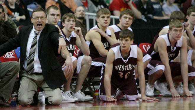 Western Christian of Hull head coach JIm Eekhoff coaches during the 2009 state boys' basketball tournament
