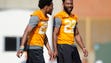 Micah Abernathy (22) and Elliot Berry (41) chat during
