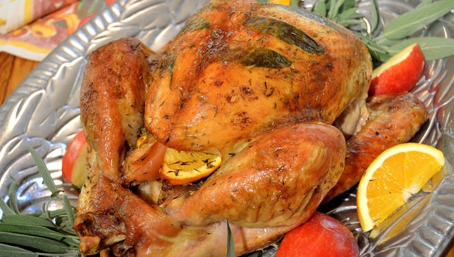Herb butter under and over the skin, and oranges and apples in the cavity, will make for an aromatic, impressive first-time Thanksgiving turkey.