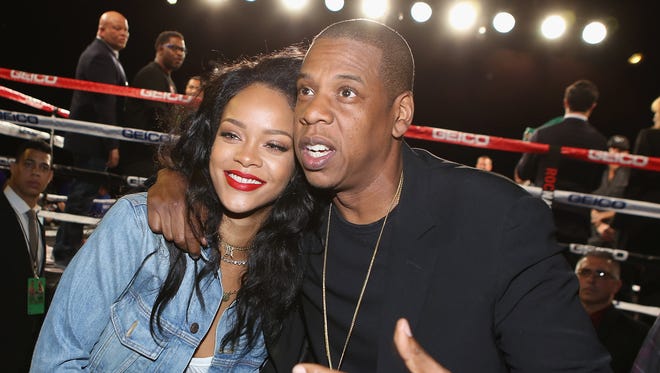 Rihanna and Jay Z attend the 2015 Throne Boxing Fight Night at The Theater at Madison Square Garden in New York.