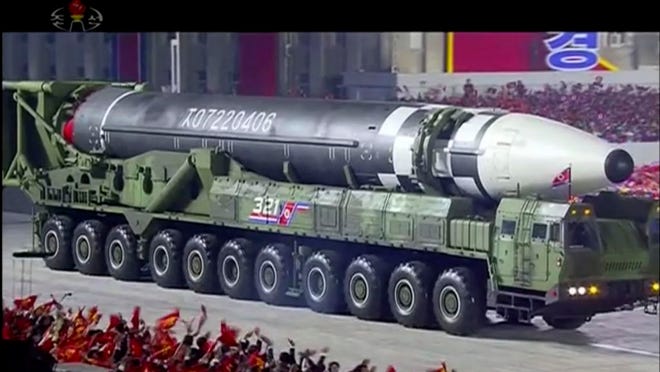 This image made from video broadcasted by North Korea's KRT, shows a military parade with what appears to be possible new intercontinental ballistic missile at the Kim Il Sung Square in Pyongyang, Saturday, Oct. 10, 2020. North Korean leader Kim Jong Un warned Saturday that his country would "fully mobilize" its nuclear force if threatened as he took center stage at a massive military parade to mark the 75th anniversary of the country's ruling party.