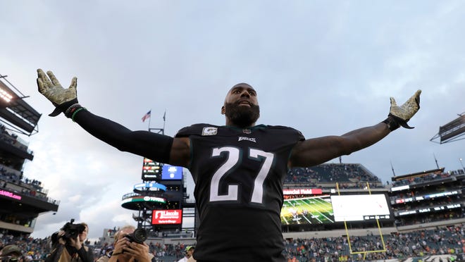 FILE - In this Nov. 5, 2017, file photo, Philadelphia Eagles' Malcolm Jenkins reacts after an NFL football game against the Denver Broncos, in Philadelphia. Shortly after franchise quarterback Carson Wentz left the field with a torn ACL in Week 14, the Philadelphia Eagles rallied to beat the Rams and win the NFC East title. In the locker room afterward, Pro Bowl safety Malcolm Jenkins gave an emotional, inspirational speech, imploring his teammates to believe they can win the Super Bowl without the guy who got them to that point. The Eagles are two wins away from their goal. First up is the NFC championship game against Minnesota.(AP Photo/Michael Perez, File)