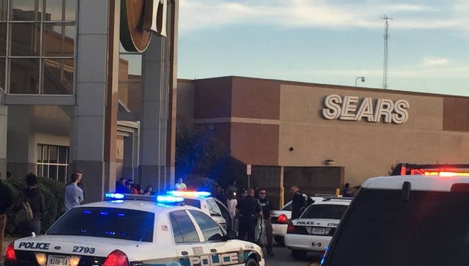 Chattanooga police officers respond to a report of a shooting at Hamilton Place mall.