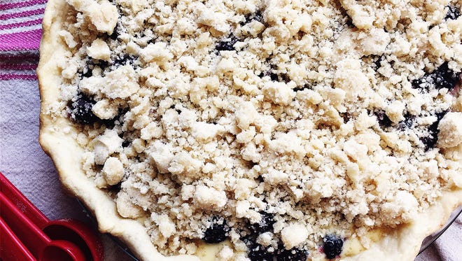 This blackberry pie features both cream and crumble. And it tastes great served warm or cold.