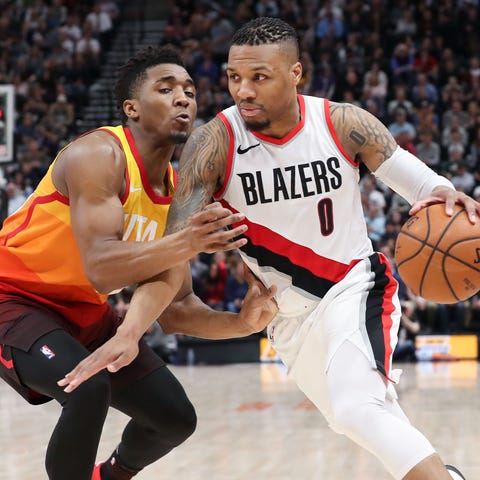 Damian Lillard (0) and the Blazers rolled by Donov