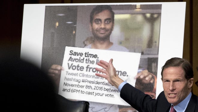 In this Oct. 31, 2017, file photo, Sen. Richard Blumenthal, D-Conn., speaks next to a poster depicting an online ad that attempted to suppress voters as Facebook's General Counsel Colin Stretch, Twitter's Acting General Counsel Sean Edgett, and Google's Law Enforcement and Information Security Director Richard Salgado, testify before a Senate Committee.