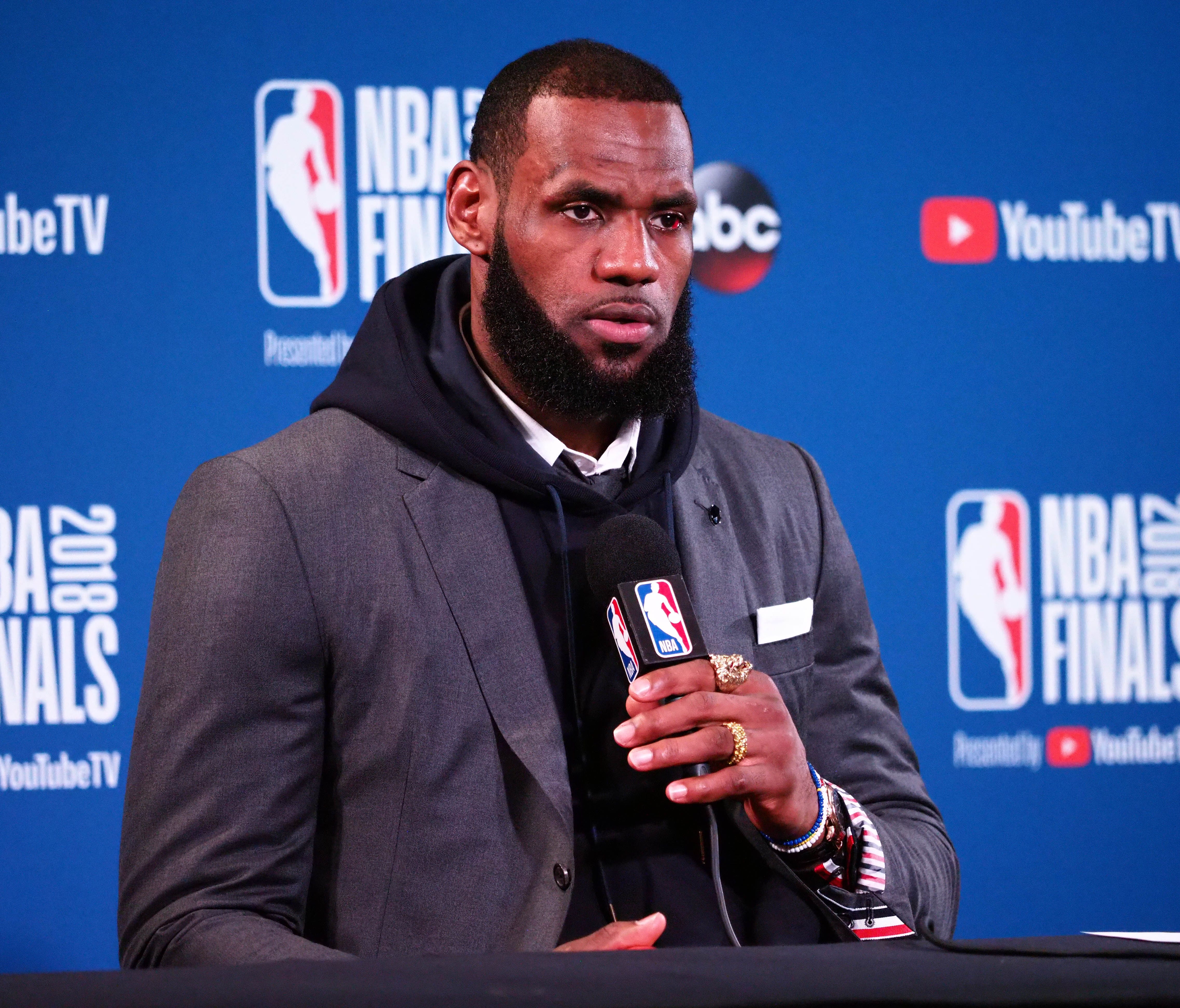 Cleveland Cavaliers forward LeBron James (23) speaks to media following game two of the 2018 NBA Finals at Oracle Arena.