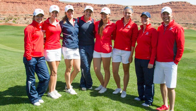 Dixie State’s Shelby Madden poses for a picture with her teammates after playing in the Entrada Classic Monday and Tuesday. Madden, traveled nearly 2,400 miles to play the game that she loves.
