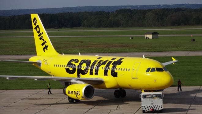Spirit Airlines rolled this Airbus A319 painted in its new livery out for photographs in Rome, N.Y., on Sept. 15, 2014.