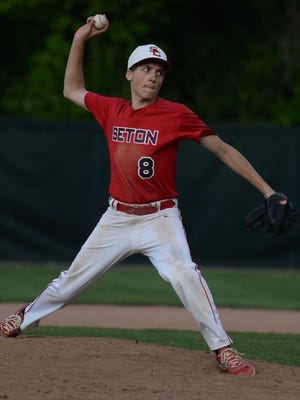 Seton Catholic starter Colten Pipenger delivers a pitch to Randolph Southern during Thursday's sectional game at McBride Stadium.