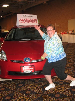 Lisa Tiensvold celebrates winning the For the Kids Charity Raffle in 2011.
