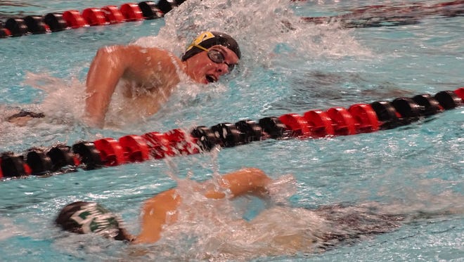 Watkins Memorial's Issaac Hansen competes in the 200 freestyle Jan. 2 during a meet against Granville and Northridge at Denison's Trumbull Aquatic Center.