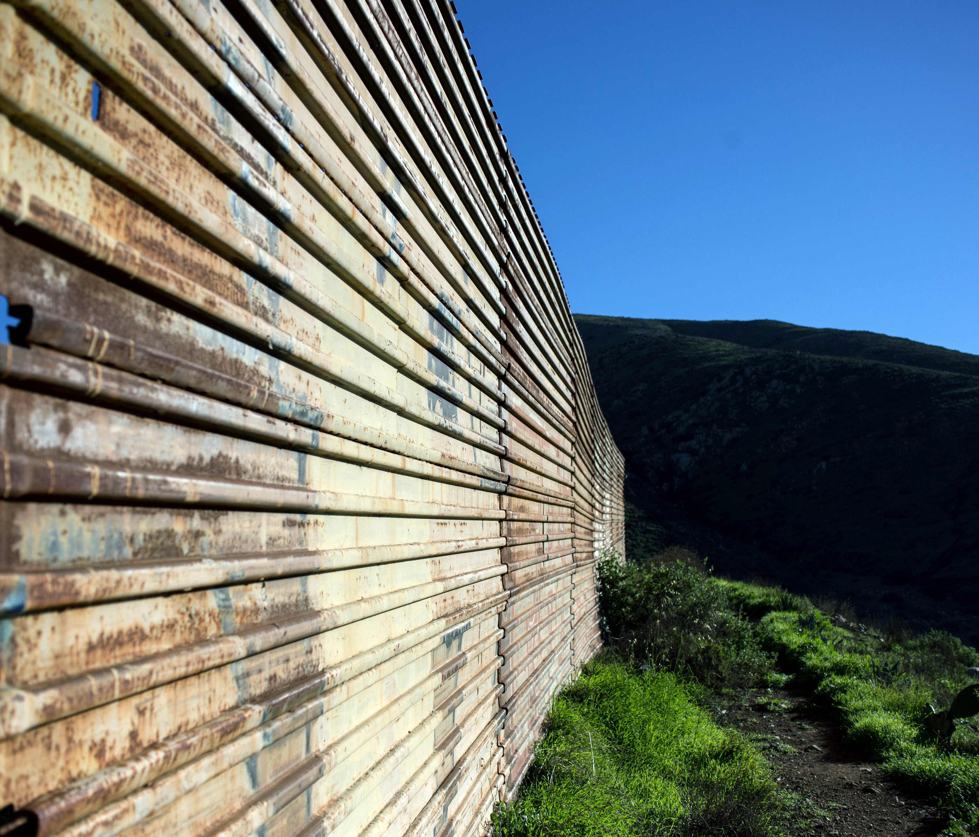 This Jan. 26, 2017, file photo, shows a view of the border fence between Mexico and the U.S., seen from the Mexican side in Tijuana.