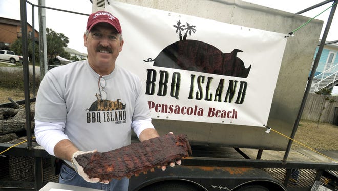 Rob Jackson of BBQ Island during the annual Smokin' in the Square BBQ cook off.