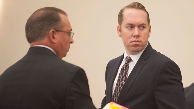 James Stuart (right), a Deptford Police Officer charged with killing his friend, Woodbury man David Compton, appears in Superior Court in Gloucester County with his attorney John Eastlack for the start of his trial. Tuesday, September 15, 2015.