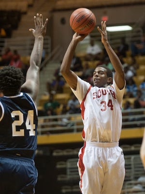 Austin Rogers (34) puts up a three pointer during the AHSAA All-Star basketball game at the Alabama State University Acadome in Montgomery, Ala., on Wednesday May 22, 2015.