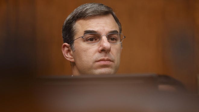 House Oversight and Reform National Security subcommittee member Rep. Justin Amash, R-Mich., looks out from the dais on Capitol Hill in Washington, Wednesday, May 22, 2019, during the House Oversight and Reform National Security subcommittee hearing on "Securing U.S. Election Infrastructure and Protecting Political Discourse."