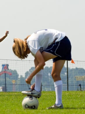 West High School junior, Cici Mercedes (cq), left, won the juggling contest during the 2009 Kil Girl's Soccer Jamboree at US Cellular Fields in West Knoxville on Saturday, August 8, 2009.