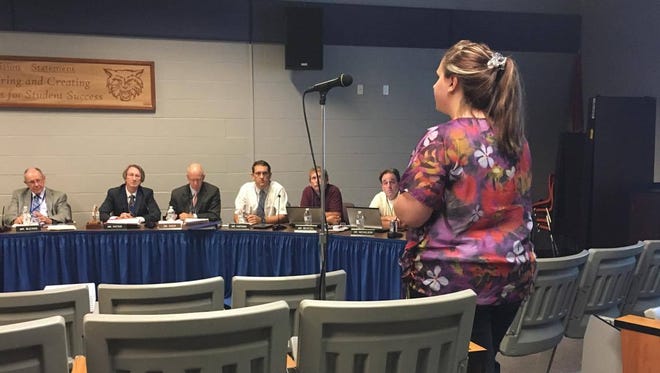 Melissa Rangel, a mother who sends her daughter to daycare, expresses her concerns to the Dallastown school board on Thursday, Aug. 11, 2016.