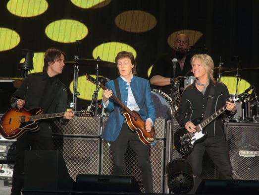 Rusty Anderson, from left, Paul McCartney and Brian