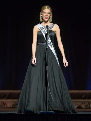 Miss Hendricks County Madeline Hayden introduces herself to the audience during the Indiana State Fair's 2015 Queen Contest. Hayden won Sunday, Jan. 4, 2015, at Indiana Farmers Coliseum.