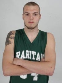 Former Raritan basketball star and two-time Asbury Park Press Player of the Year Mike Aaman shown here posing for his POY photo. Asbury Park Press Staff Photo by Robert Ward