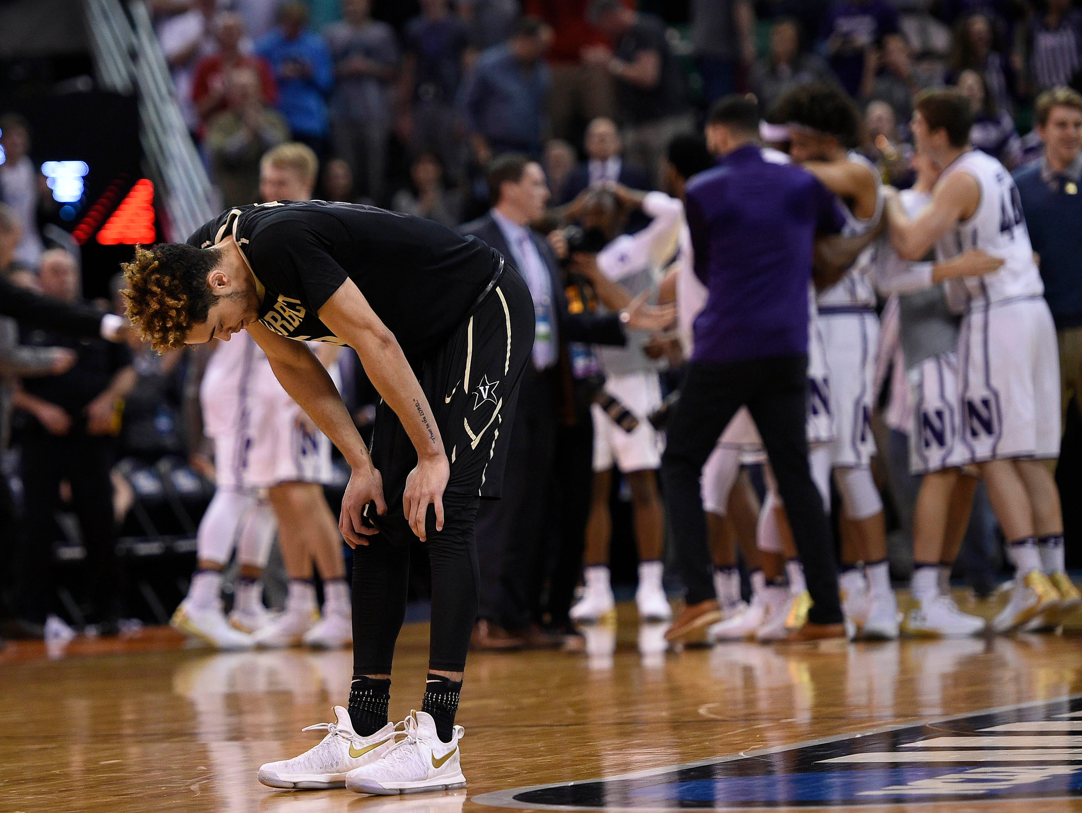 Vanderbilt Commodores guard Matthew Fisher-Davis (5) reacts following the 68-66 loss against the Northwestern Wildcats in the first round of the NCAA tournament at Vivint Smart Home Arena.