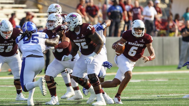 Evans (6) was benched for backup Garrett Smith in the third quarter of ULM's 47-37 loss to Georgia State.