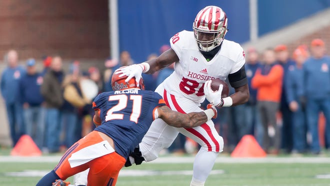 Indiana Hoosiers tight end Ian Thomas worked last fall to avoid Illinois defensive back Patrick Nelson.