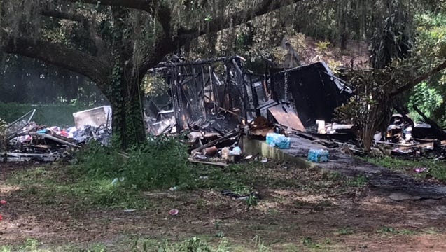 A body found in the rubble of this burned home on Scott Lane has been identified as the owner, Tamela Sweeley-Bissonnette.