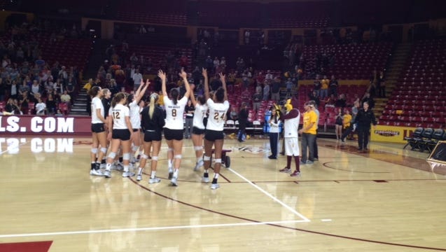 No. 22 ASU volleyball celebrates its 3-2 win over No. 17 UCLA on Wednesday.