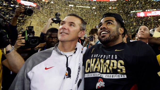 Ohio State coach Urban Meyer, left, and Ezekiel Elliott celebrate after winning the inaugural College Football Playoff championship in January.