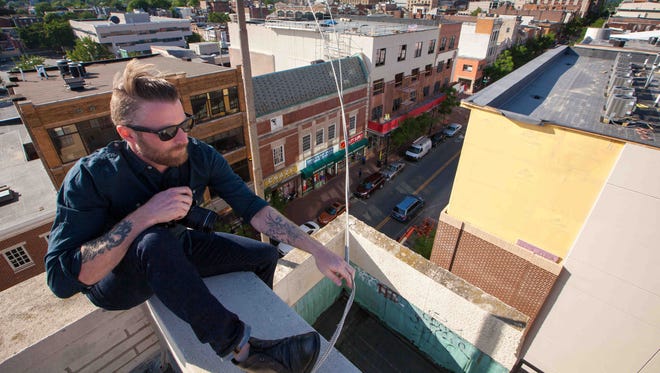 Nick McNevich of Wilmington sees a unique perspective on the city of Wilmington as he explores the rooftops of the city in what he calls urban expedition.