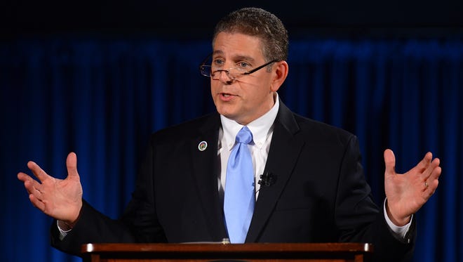 Lansing Mayor Virg Bernero vetoed Wednesday City Council's moratorium on payment in lieu of taxes incentives for low income housing projects.