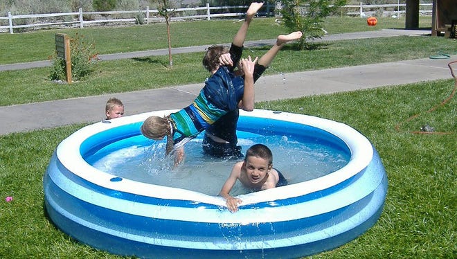 From 2008: The youngest members of the Pearson family enjoy a splashing-good time at Dayton State Park.