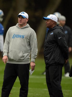 Detroit Lions coach Jim Caldwell and offensive coordinator Jim Bob Cooter, left, supervise practice at the Grove.