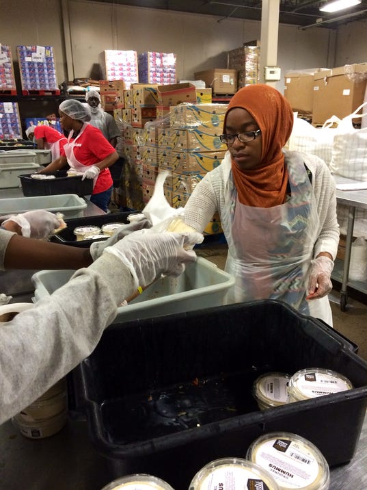 During Ramadan month, local Muslims help feed the hungry