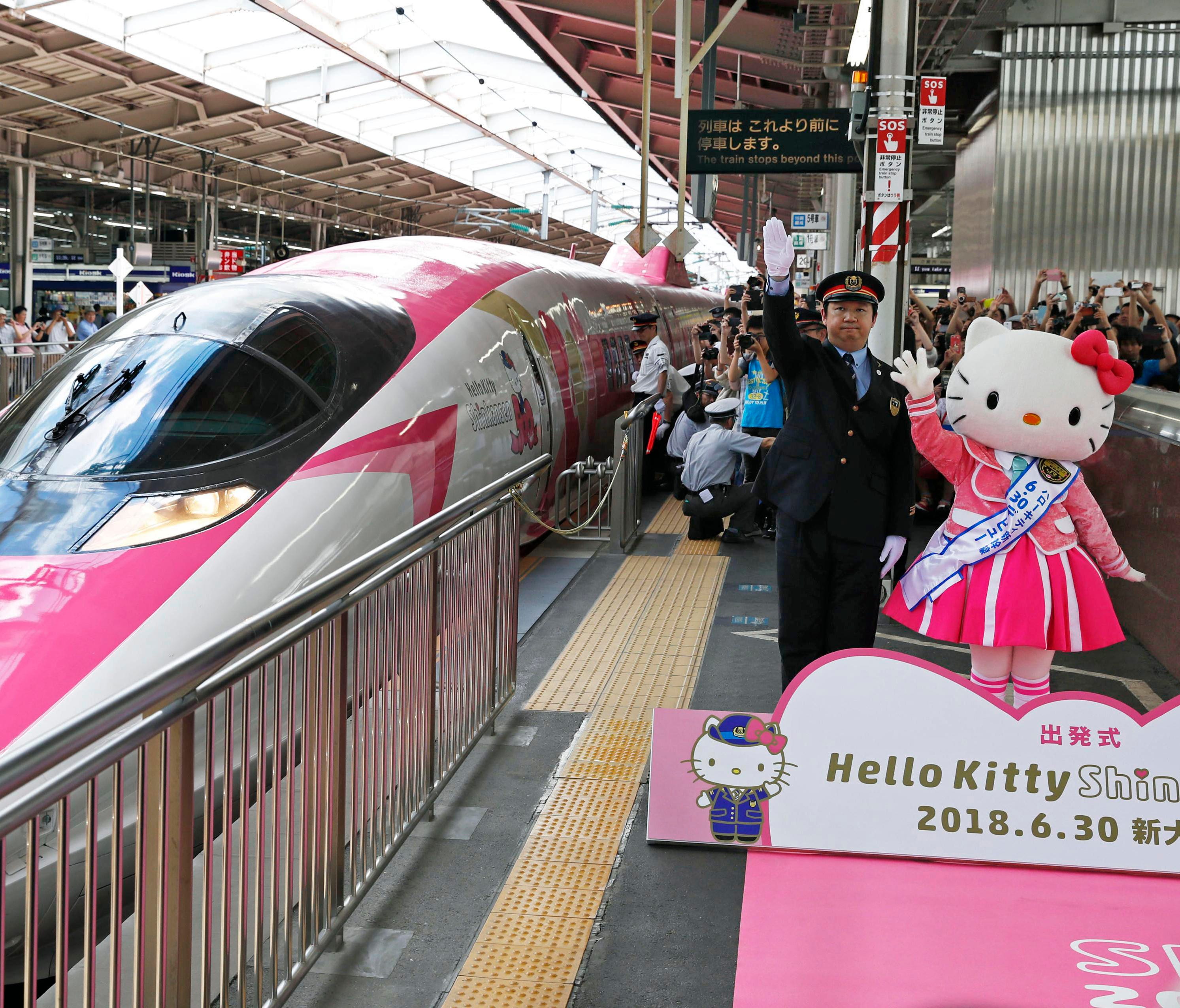 A Hello Kitty-themed bullet train is unveiled at JR Shin Osaka station, in Osaka Japan, June 30, 2018.  The special train had its inaugural round trip Saturday between Osaka and Fukuoka, connecting Japan's west and south until the end of September. T