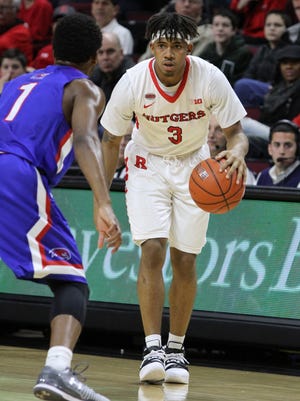 Rutgers' Corey Sanders looks for a pass during the first half of the men's basketball game against UMass Lowell at Rutgers Athletic Center in Piscataway, NJ Monday December 28, 2015.